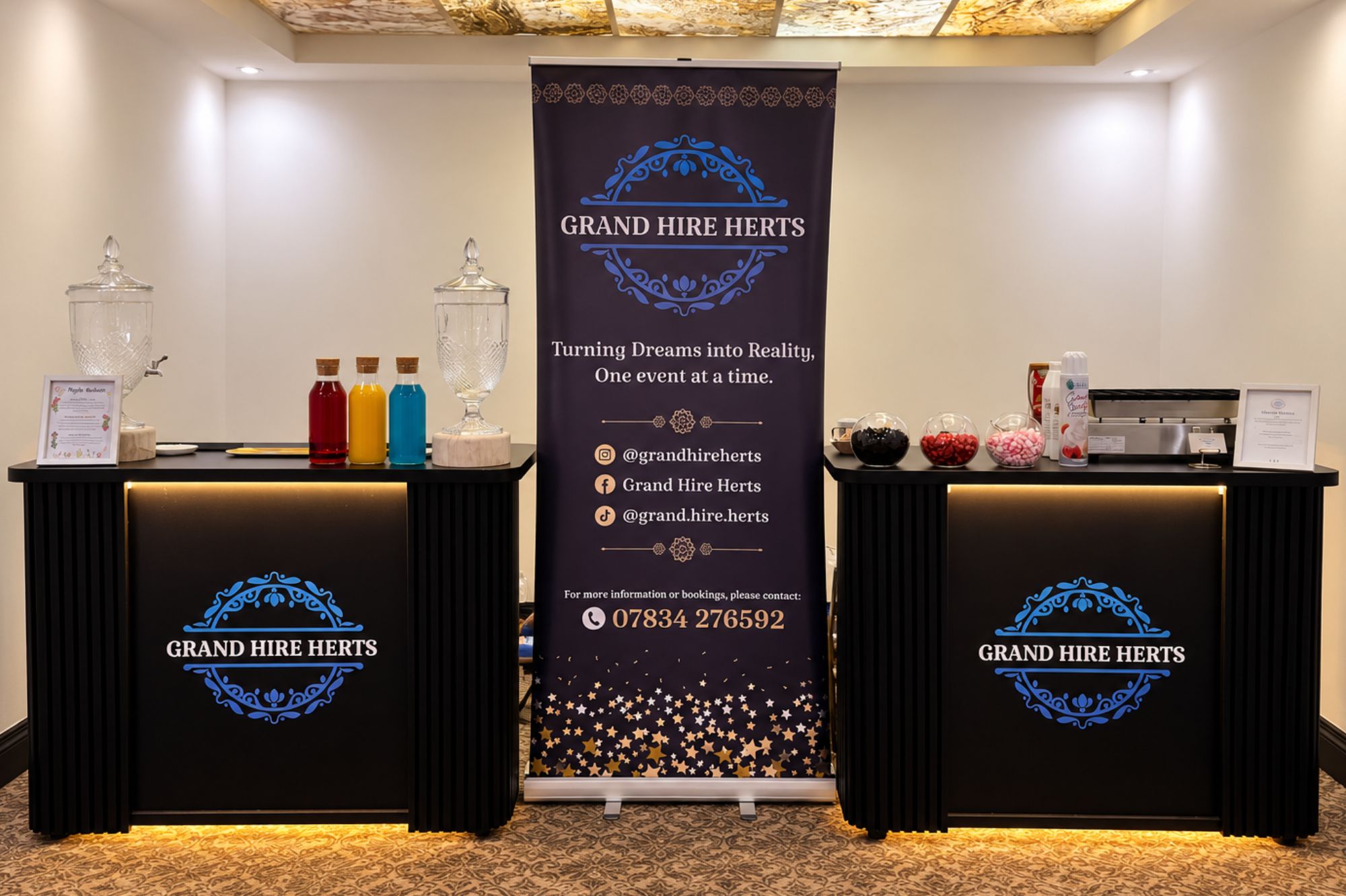 Grand Hire Herts serving stations with branded counters and drinks.
