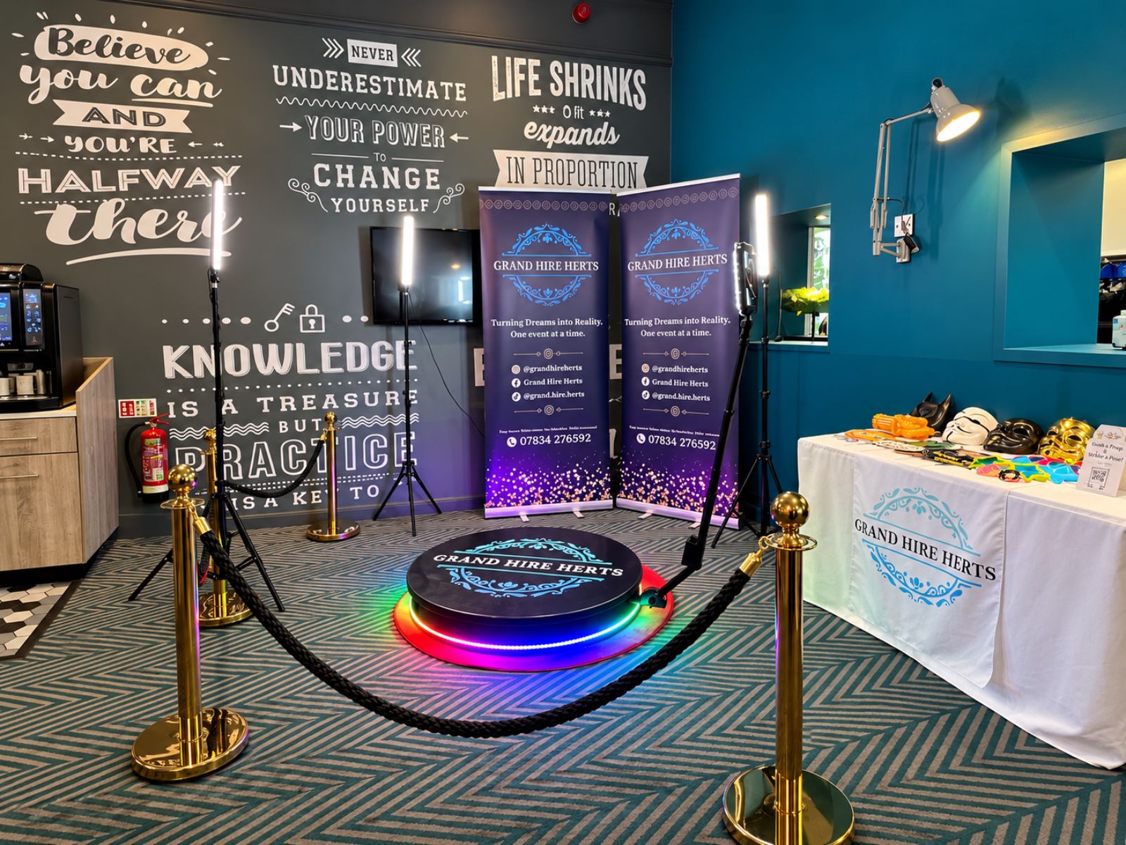 360 video booth arranged with lighting and a sharing station.